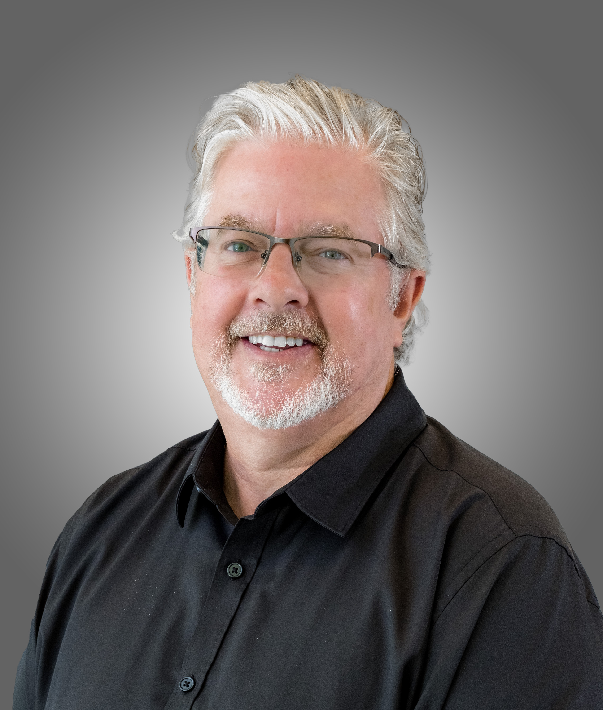 Kevin D Higgins — Piano Man Realtor headshot
